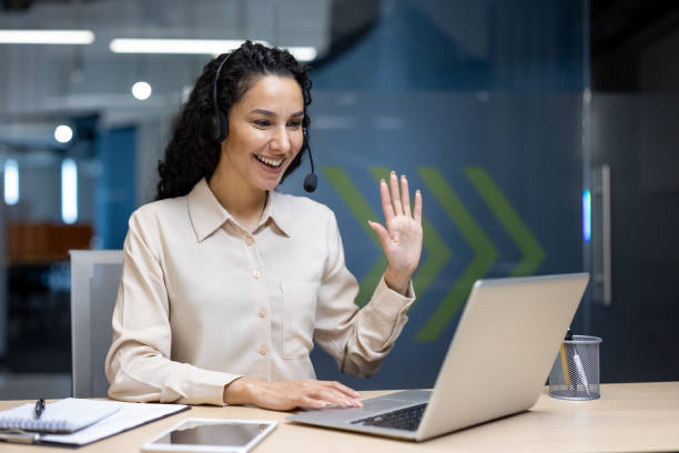 istock Woman having a professional video call in modern office setting 2167824010