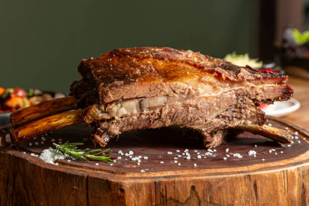 istock Rib roast on a wooden board 2167828558