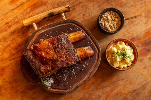 istock Rib roast on a wooden board 2167828565