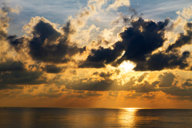 Sunrise on water in morning at beach Hat Ban Krut Prachuap Khiri Khan Province in Thailand is famous for travel and relax