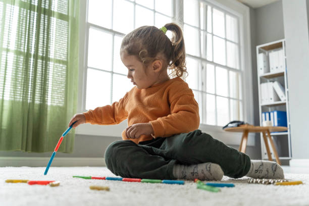 istock Early Childhood Development. Kid Plays with Magnet Toys. copy space 2167838459