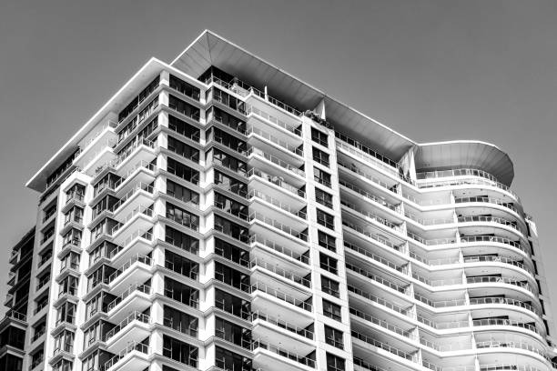 Black and white modern apartment building, background with copy space, full frame horizontal composition