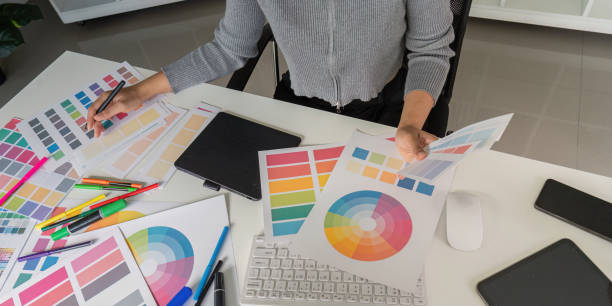 istock Creative Graphic Designer Working on Color Palettes and Design Concepts at Modern Workspace 2167850356