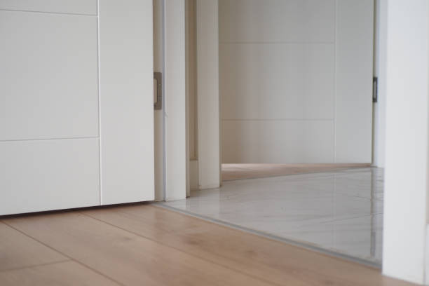 istock Explore the modern and stylish interior transition between luxurious wood and elegant tile floors 2167856026