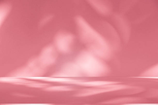 istock Wall interior background, studio, and backdrops show products. with shadow from window color white and pink light. background for text insertion and presentation of product 2167857141