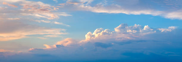 istock Sky panoramic background. Romantic pink clouds in the dawn sky. Tender mood Sunrise Sundown Sunset sky panorama. 2167858886