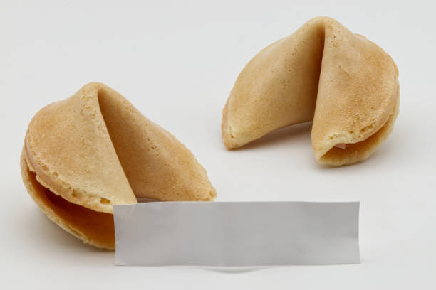 istock Chinese Fortune Cookies with blank paper for prediction message. 2167860652