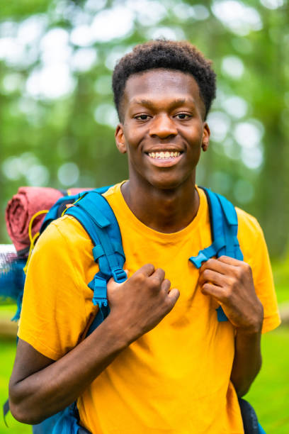 istock African backpacker enjoying adventure in natural park 2167863388