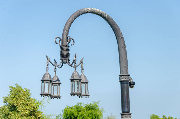 Classic decorative street lamp with surveillance camera