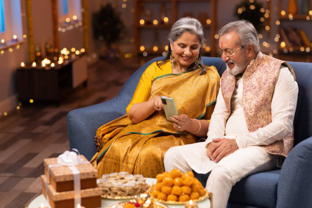 istock Senior couple using phone stock photo 2167866717