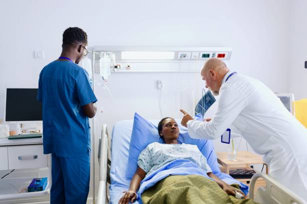 istock Doctor doing a medical exam with his patient 2167868770
