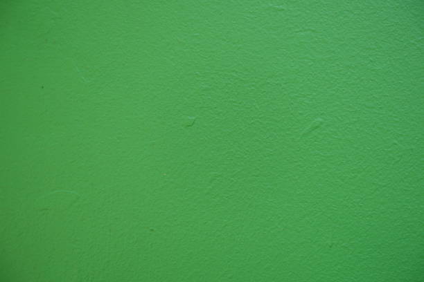 Macro of bright may green painted wall
