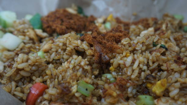 istock fried rice wrapped in brown rice paper 2167871530