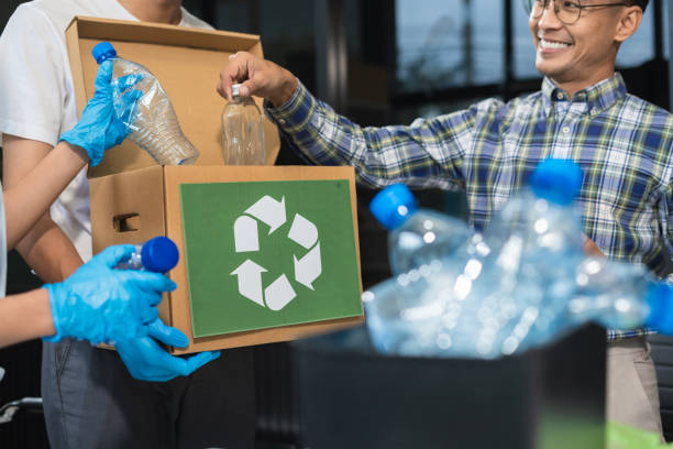 istock Business people working examining waste recyclable separation divided bin in the office, Sustainable development and innovation green business concept. 2167877535