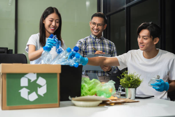istock Business people working examining waste recyclable separation divided bin in the office, Sustainable development and innovation green business concept. 2167877562