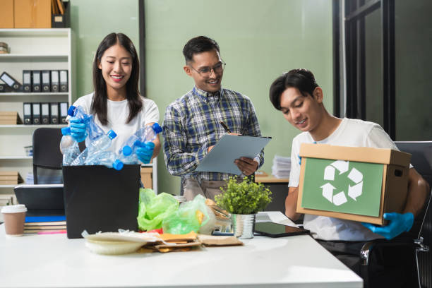 istock Business people working examining waste recyclable separation divided bin in the office, Sustainable development and innovation green business concept. 2167877583