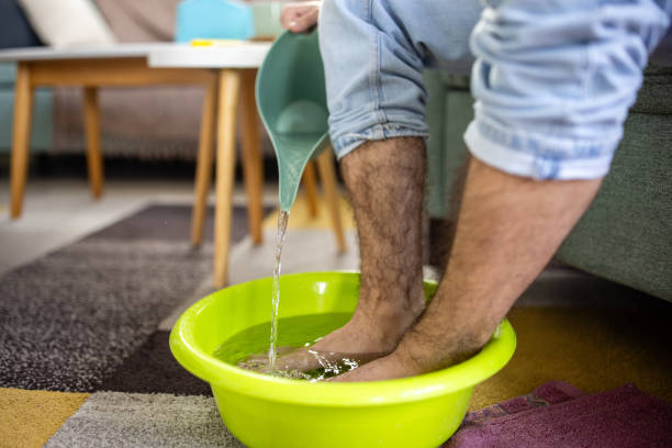 Close up image photography of a human hand in action with water