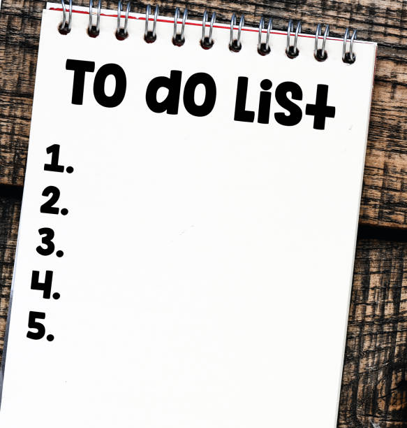 istock TO DO LIST words written in an office notebook. 2167879770