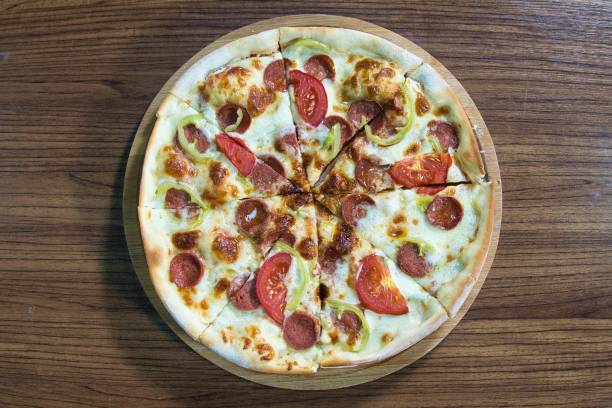 istock Pepperoni Pizza With Green Peppers and Tomatoes 2167880504