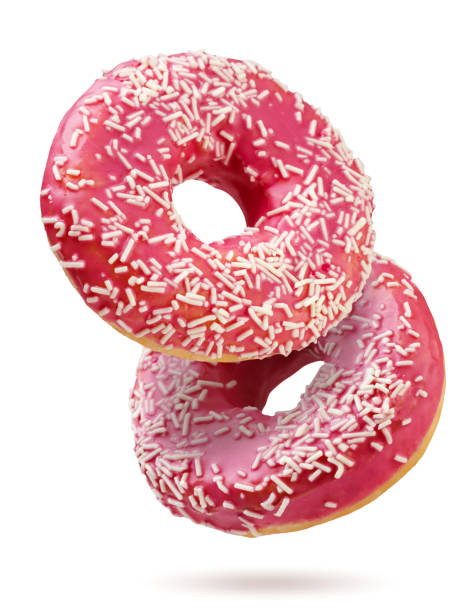 istock Sweet donuts flying close-up on white. Isolated 2167882138