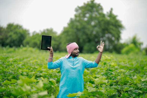 istock happy young Indian farmer using smart phone 2167882554