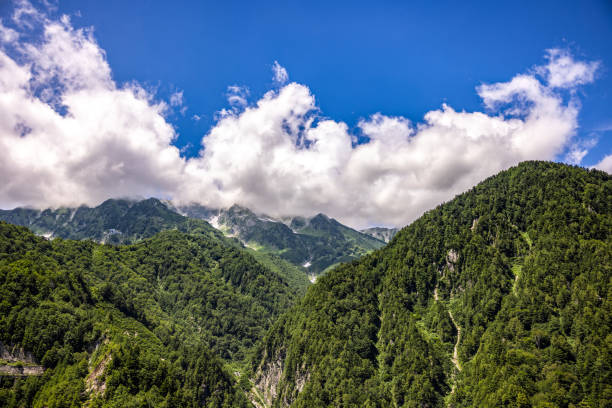 istock Lush Green Mountain Landscape Under a Blue Sky with Clouds.  Toyama, Japan 2167889021