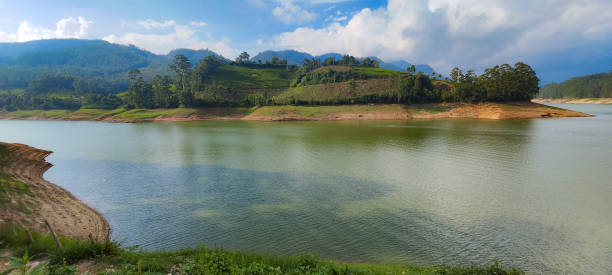 istock Beautiful lake with mountains and blue sky 2167889187