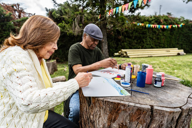 istock Senior friends doing recreational painting activity 2167891730