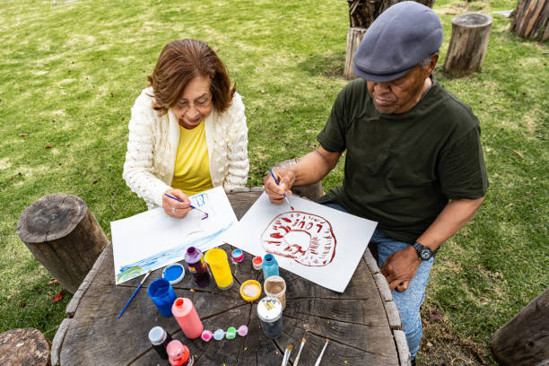 istock Senior friends doing recreational painting activity 2167891796