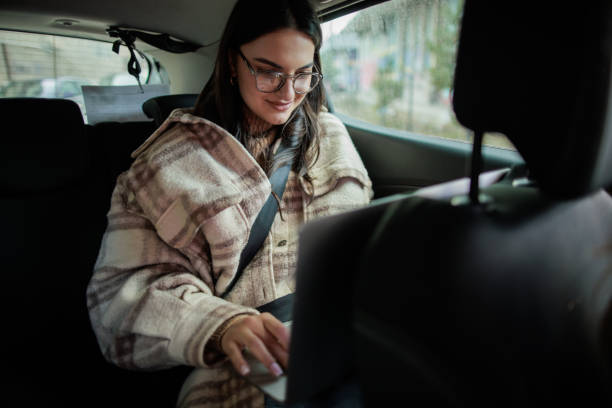 istock Woman riding in a car as a passenger 2167901335