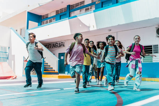 istock Child students running through the school 2167904133