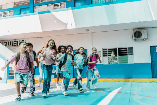 istock Child students running through the school 2167904199