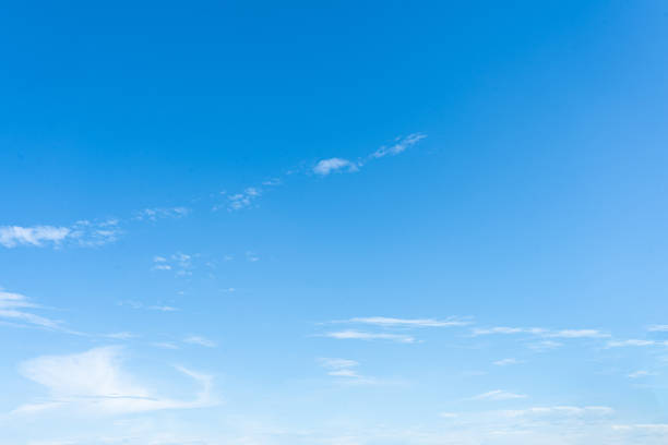 istock Beautiful blue sky with fluffy white clouds on a sunny day 2167905709