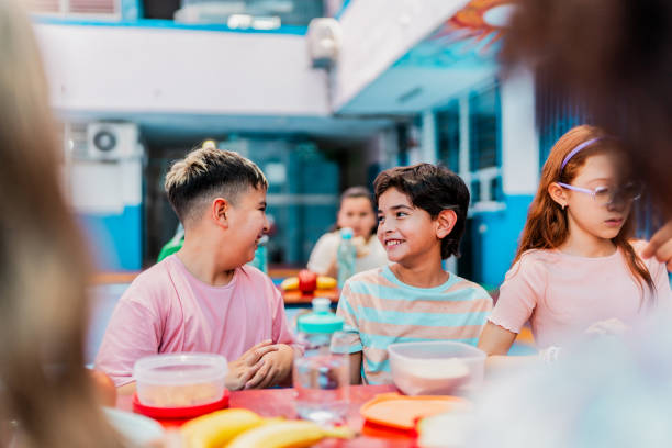istock Child students talking and eating on snack time at school 2167905793