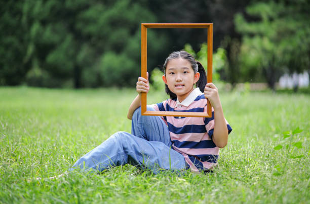 Litter girl in the picture frame