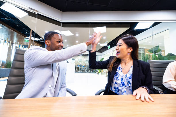 istock Enthusiastic business people celebrating 2167908831