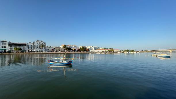 istock Daylight's Embrace: A Boat's Tranquil Journey on the River 2167909601