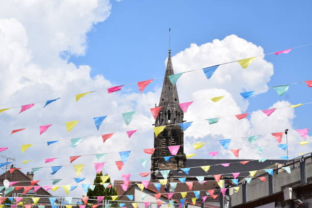 istock colorful flags in front of a church 2167909879