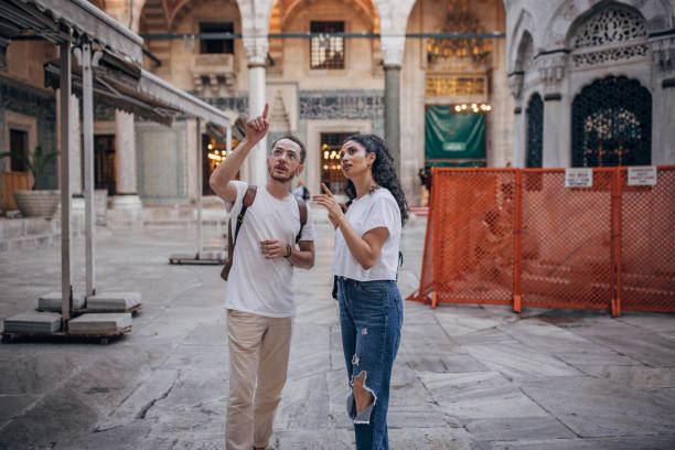 istock People talking in the Suleymaniye Mosque. 2167913257
