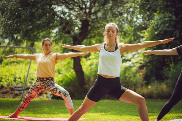 istock Yoga session masterclass in serene green nature 2167915511
