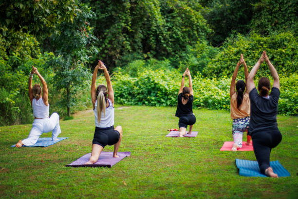 istock Yoga session masterclass in serene green nature 2167915721