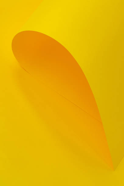 istock plastic or paper sheet, rolled up, abstract background 2167919707