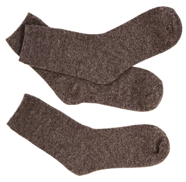 istock knitted warm wool socks, insulated on a white background 2167920271