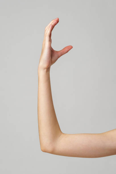 istock Close Up of a Woman's Arm Extended Upward 2167922734