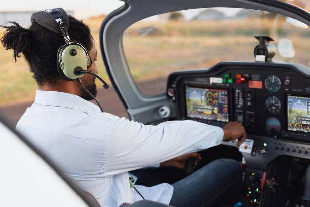 istock African American airplane pilot starting a plane 2167925253