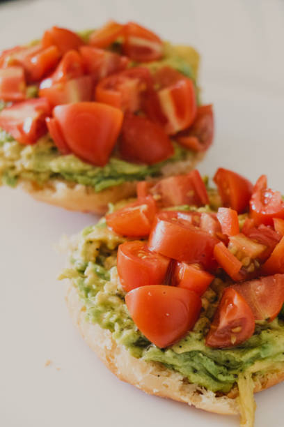 istock avocado toast full of tomatoes 2167925441