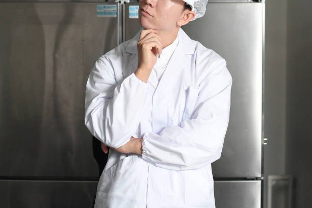 istock A man wearing cooking clothes and thinking in the kitchen 2167926601