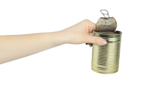 istock open tin can in hand, outstretched hand with tin can isolated from background 2167932237