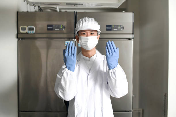istock Asian man wearing sanitary clothes inspecting kitchen equipment 2167932329