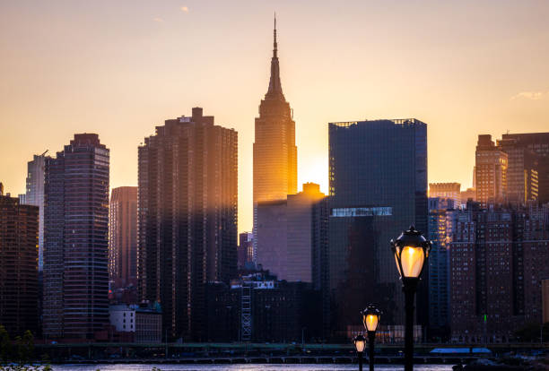 istock Glowing Manhattan Skyline at Sunset 2167939423